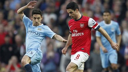Arteta (Arsenal) face à Navas (Manchester City) (IAN KINGTON / AFP)