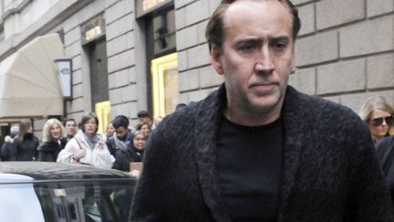 M&ecirc;me quand Nicolas Cage fait du shopping &agrave; Milan, on dirait qu'il est poursuivi par des m&eacute;chants. (SIPA)