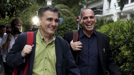 &nbsp; (Euclide Tsakalotos et Yanis Varoufakis se rendent au bureau du premier ministre le 28 juin © Reuters)