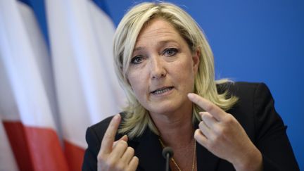 Marine Le Pen en conf&eacute;rence de presse, le 25 juin 2014, au si&egrave;ge du FN &agrave; Nanterre (Hauts-de-Seine).&nbsp; (STEPHANE DE SAKUTIN / AFP)