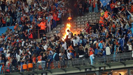 Un incendie dans les tribunes du Stade de France (Seine-Saint-Denis) lors de la finale de la Coupe de France entre l'OM et le PSG, le 21 mai 2016.&nbsp; (MAXPPP)