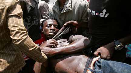 a dégénéré à Nairobi, la police faisant usage de gaz lacrymogènes contre les manifestants. Même chose à Machakos (60 km au sud-est de Nairobi), où les contestataires ont été dispersés par les forces de l'ordre. (REUTERS/Thomas Mukoya)