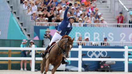 Simon Delestre et I Ameluusina R 51, à Versailles, le 2 août 2024. (ROLF VENNENBERND / DPA)