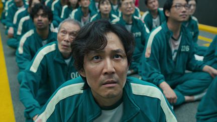 L'acteur Jung-jae Lee dans le rôle de Gi-hun, héros de la série "Squid Game".&nbsp; (NETFLIX)