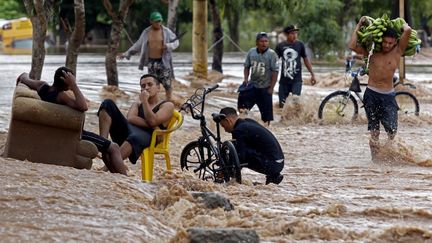 Une rue inondée à El Progreso, au Honduras, le 18 novembre 2020, après le passage de l'ouragan Iota. (AFP)