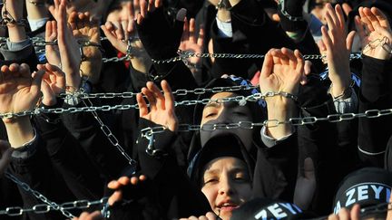 Moment intense dans la vie d'un chiite, l'Achoura est l'occasion pour les fid&egrave;les d'expier les fautes de leurs anc&ecirc;tres. (MUSTAFA OZER / AFP)