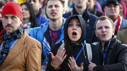 Les Russes sous le choc apr&egrave;s l'&eacute;limination de leur &eacute;quipe de hockey sur glace en quart de finale apr&egrave;s une d&eacute;faite 3-1 face &agrave; la Finlande, mercredi 19 f&eacute;vrier.&nbsp; (SHAMIL ZHUMATOV / REUTERS)