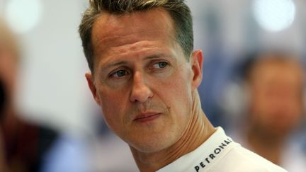 Le champion de Formule 1 Michael Schumacher &agrave; Singapour, le 23 septembre 2012. (JENS BUTTNER / DPA / AFP)