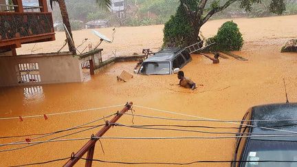 Une rue inondée de Freetown (Sierra Leone), le 14 août 2017. (SOCIETY 4 CLIMATE CHANGE COMMUNICATION / AFP)