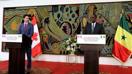 Le Premier ministre canadien Justin Trudeau et le président sénégalais Macky Sall à Dakar, le 12 février 2020. (ALAATTIN DOGRU / ANADOLU AGENCY)