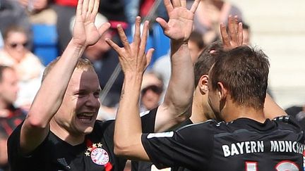 Sebastian Rode (à gauche) a ouvert le score pour le Bayern Munich qui s'est imposé 2-0 à Hoffenheim. (DANIEL ROLAND / AFP)