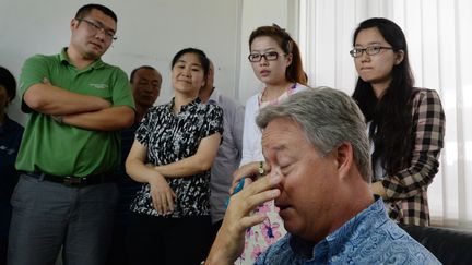 Chip Starnes, retenu dans son usine par des salari&eacute;s, pr&egrave;s de P&eacute;kin (Chine), le 26 juin 2013. (MARK RALSTON / AFP)