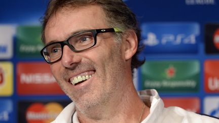 Laurent Blanc, l'entraîneur du PSG, en conférence de presse. (MIGUEL MEDINA / AFP)