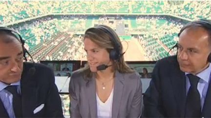 Patrice Dominguez (à droite), en compagnie d'Amélie Mauresmo et de Français Brabant à Roland-Garros