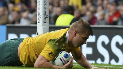 L'ailier des Wallabies, Drew Mitchell, auteur de quatre essais déjà durant le Mondial et avant la finale contre les Blacks. (GLYN KIRK / AFP)