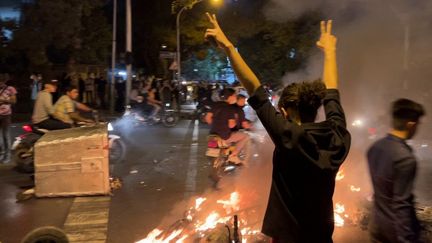 Des manifestants dans les rues de Téhéran, le 19 septembre 2022. (AFP)