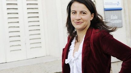 Cécile Duflot se réjouit d'obtenir le premier groupe Vert à l'Assemblée. (BERTRAND GUAY / AFP)