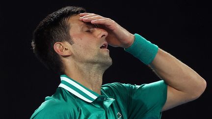 Novak Djokovic le 26 février 2021 lors des quarts de finale de l'Open d'Australie contre l'allemand Alexander Zverev. (BRANDON MALONE / AFP)