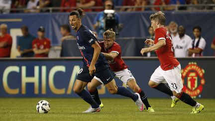 Zlatan Ibrahimovic et le PSG ont conclu une préparation convaincante par une victoire contre Manchester United. (JOSHUA LOTT / AFP)