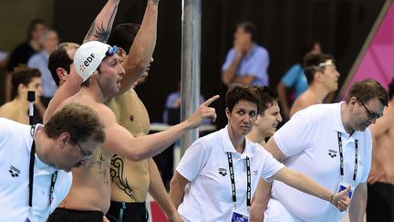 Fabien Gillot, William Meynard et Florent Manaudou attendent Clément Mignon (LEON NEAL / AFP)