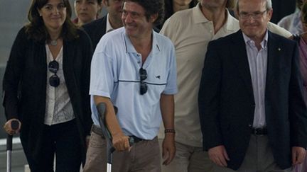 Roque Pascual et Albert Vilalta, volontaires de l'ONG catalane Accio Solidaria, à leur arrivée à Barcelone le 24/08/10 (AFP. J.Lago)