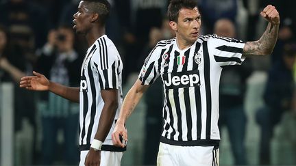 Pogba et Mandzukic, hommes clés de la Juve (MARCO BERTORELLO / AFP)