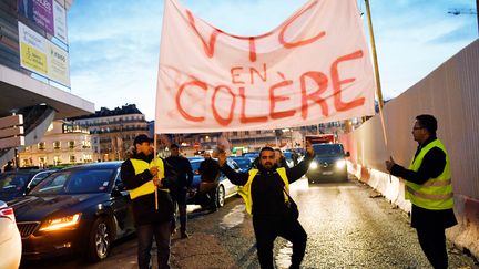 Une manifestation de VTC en janvier 2019 à Paris (BERTRAND GUAY / AFP)