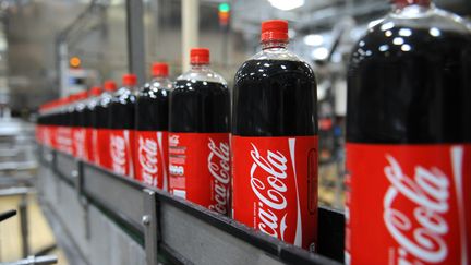 Coca-Cola esp&egrave;re commencer sa production en Birmanie "le plus vite possible". (REMY GABALDA / AFP)