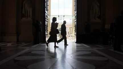 A l'Assemblée nationale, deux députés (AFP/Thomas Coex)