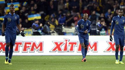 Les joueurs français Paul Pogba, Eric Abidal et Blaise Matuidi