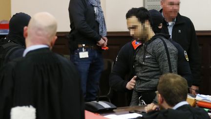 Le complice de Salah Abdeslam, Sofiane Ayari, lors de son procès à Bruxelles (Belgique), le 8 février 2018. (FRANCOIS LENOIR / AFP)