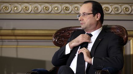 Le président de la République François Hollande et ses fameuses cravates de travers. (PHILIPPE WOJAZER / POOL)