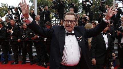 L'acteur autrichien Helmut Berger lors de la 67e édition du Festival de Cannes, le 17 mai 2014. (VALERY HACHE / AFP)