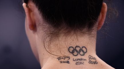 Un joli CV olympique tatoué sur la nuque de la gymnaste Vanessa Ferrari. Il manque "Tokyo 2020" non ? (LOIC VENANCE / AFP)