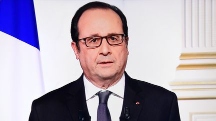 François Hollande lors de ses voeux aux Français pour l'année 2017, le 31 décembre 2016 à l'Elysée. (OLIVIER MORIN / AFP)