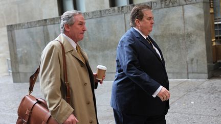 Les avocats de la Trump Organization arrivent à la Cour suprême de New York pour l'audience de détermination de la peine de la Trump Organization, le 13 janvier 2023 à New York. (MICHAEL M. SANTIAGO / GETTY IMAGES NORTH AMERICA)