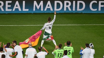 "Nous méritions depuis tant d'années de savourer une telle victoire", a lancé Sergio Ramos (FRANCISCO LEONG / AFP)