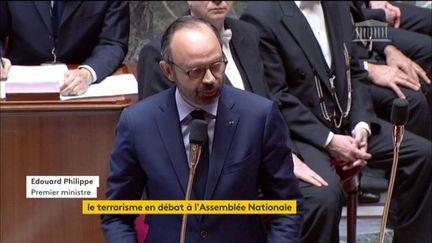 Edouard Philippe devant l'Assemblée nationale pendant l'hommage aux victimes des attaques dans l'Aude