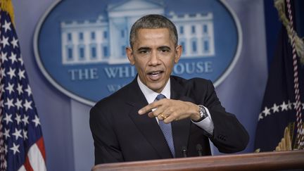 Le pr&eacute;sident am&eacute;ricain Barack Obama, le 19 d&eacute;cembre 2014 &agrave; Washington (Etats-Unis). (BRENDAN SMIALOWSKI / AFP)