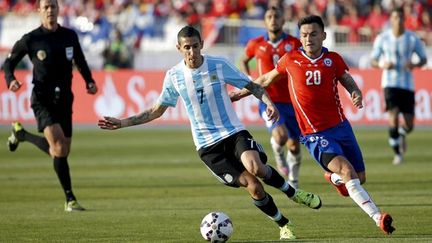 &nbsp; (Angel Di Maria face aux joueur du Chili, pendant la finale de la Copa América © MAXPPP)