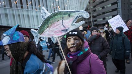 Des manifestants en marge de la COP15 biodiversité à Montréal (Canada), le 10 décembre 2022. (ALEXIS AUBIN / AFP)