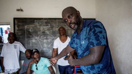 L'ancien ballon d'or africain dans la présidentielle au Liberia pour la troisième fois. (MARCO LONGARI / AFP)