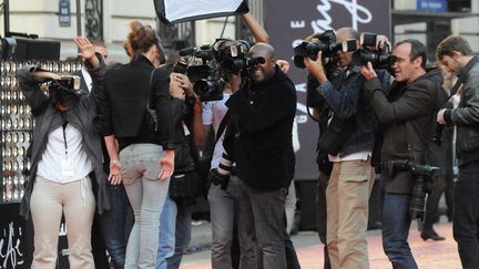 Top-model et photographes, à Paris le 15 septembre 2011 (NATHANAEL CHARBONNIER / FRANCEINFO / RADIOFRANCE)