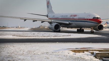 L'aéroport de Roissy sous la neige (18-12-2009) (AFP PHOTO MEHDI FEDOUACH)