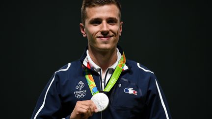 Jean Quiquampoix, médaille d'argent du tir au pistolet vitesse 25 mètres (PASCAL GUYOT / AFP)