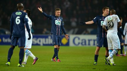 Le joueur du Paris Saint-Germain David&nbsp;Beckham, au centre, lors d'un match en 8e de finale de la Coupe de France, le 27 f&eacute;vrier 2013 &agrave; Paris. (MIGUEL MEDINA / AFP)