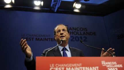 François Hollande lors de l'inauguration de son siège de campagne (FRED DUFOUR / POOL / AFP)