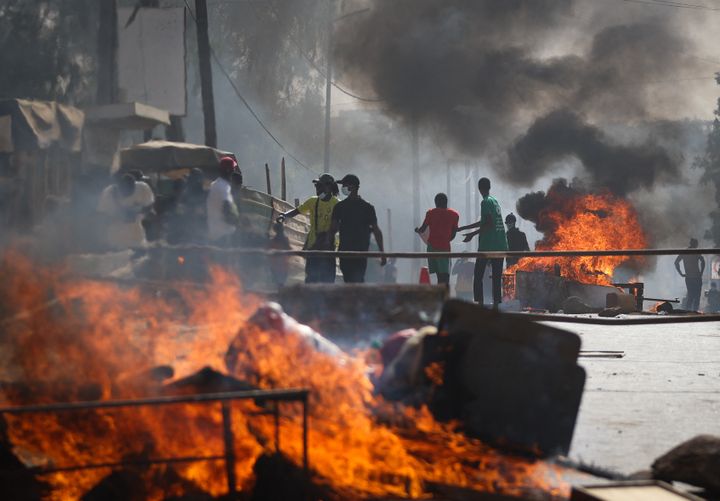 Opposition supporters demonstrate in Dakar, Senegal, February 4, 2024. (CEM OZDEL / ANADOLU / AFP)