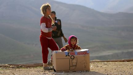 &nbsp; (Yézidis sur le mont Sinjar en Irak ©  REUTERS)