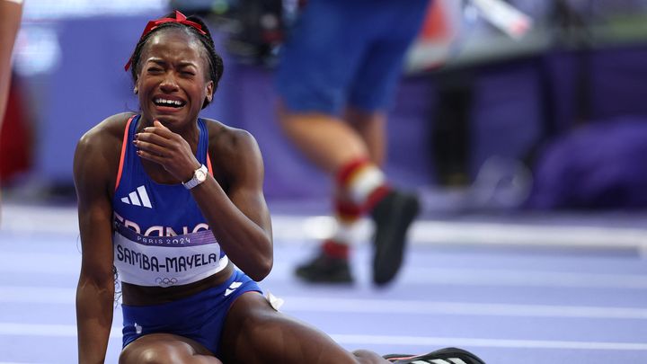 L'émotion de la Française Cyréna Samba-Mayela, après la finale du 100 m haies des JO de Paris 2024, le 10 août. (ANNE-CHRISTINE POUJOULAT / AFP)